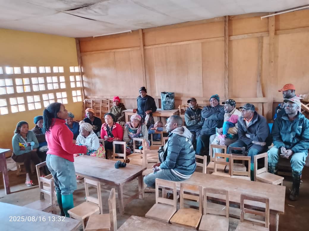 Educational session with community members in classroom setting